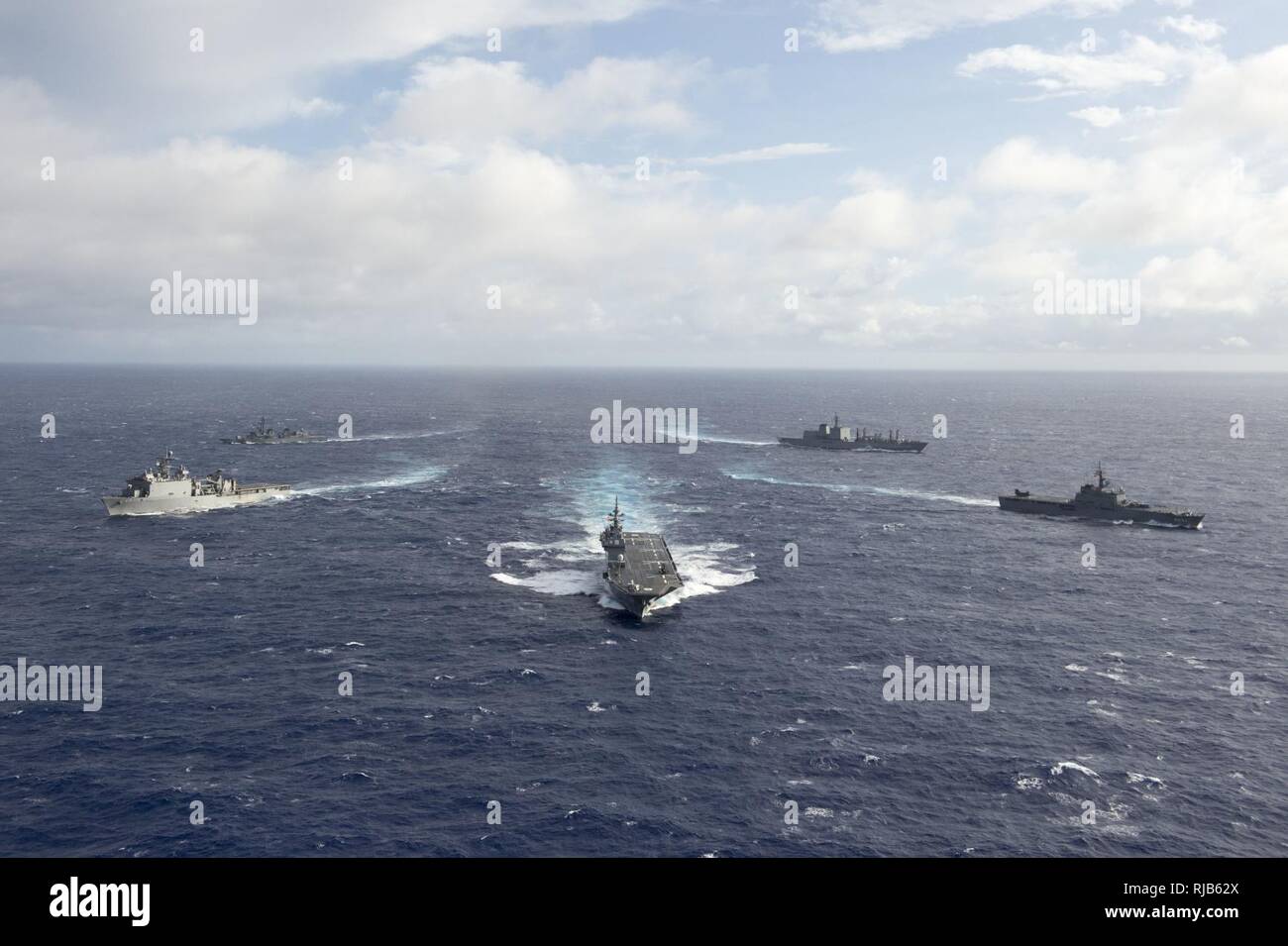 PACIFIC OCEAN (Nov. 6, 2016) - Ships participating in Keen Sword 2017 steam in formation during a photo exercise. Keen Sword 17 is a joint and bilateral field training exercise (FTX) between U.S. and Japanese forces meant to increase readiness and interoperability within the framework of the U.S. – Japan alliance. Stock Photo