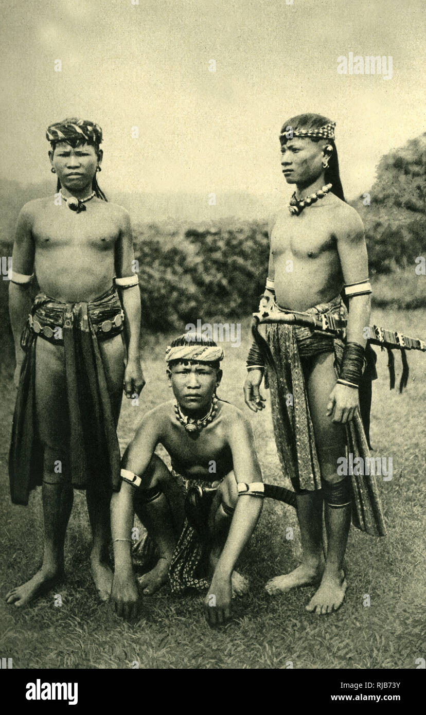 Three Sea Dayak warriors, Borneo, SE Asia Stock Photo
