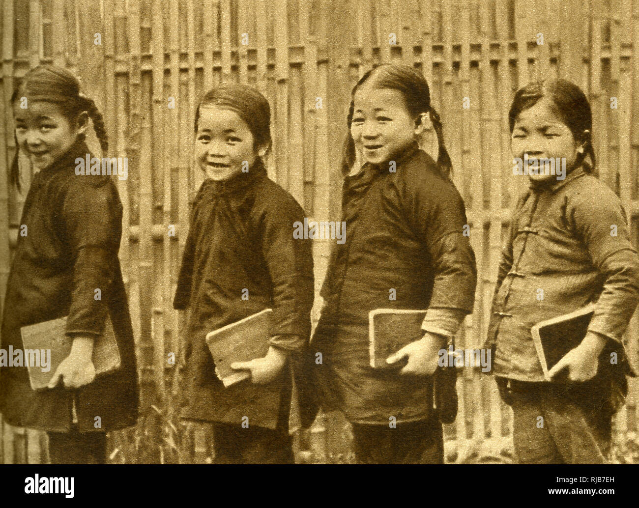 Four schoolgirls of Changsha with books, China, East Asia Stock Photo ...