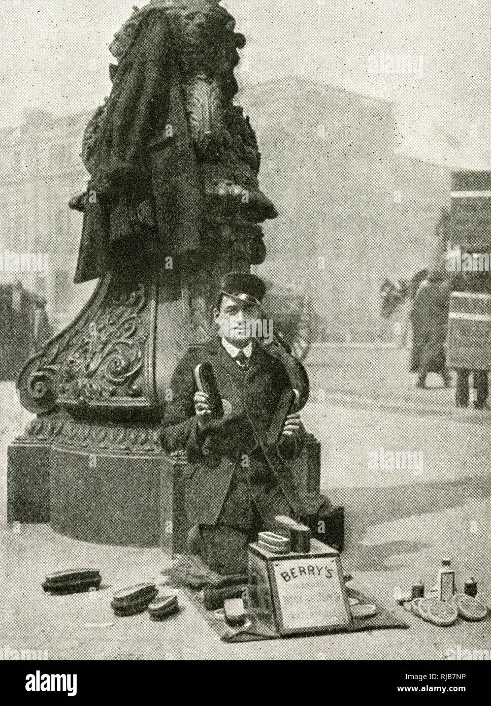 Shoeshine man in a Central London street Stock Photo