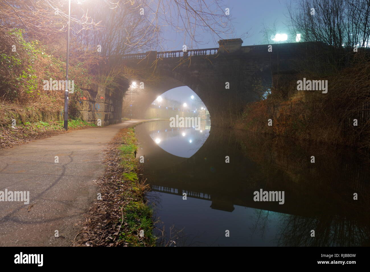 Reflections of Whitehall Road Bridge along the Aire & Calder Navigation