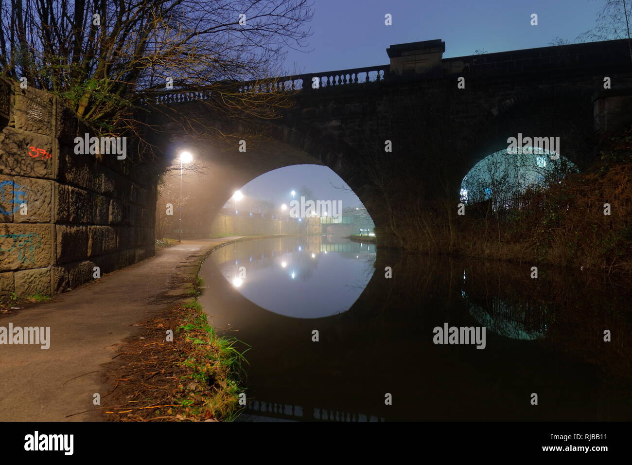 Reflections of Whitehall Road Bridge along the Aire & Calder Navigation
