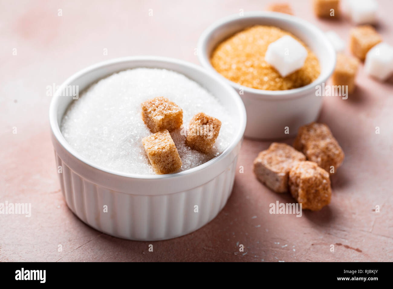 White and brown cane sugar Stock Photo Alamy