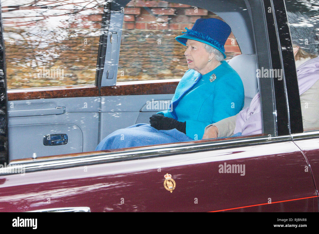 PIC BY GEOFF ROBINSON PHOTOGRAPHY 07976 880732.    Picture showsThe Queen leaving St Mary Magdalene Church at Sandringham, Norfolk, on January 27th after morning service, and not wearing a safety belt. Stock Photo