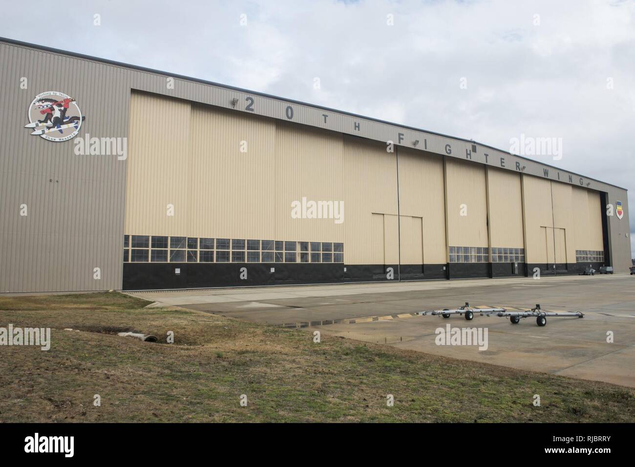 The southern face of Hangar 1200 displays the Wild Weasel and 20th