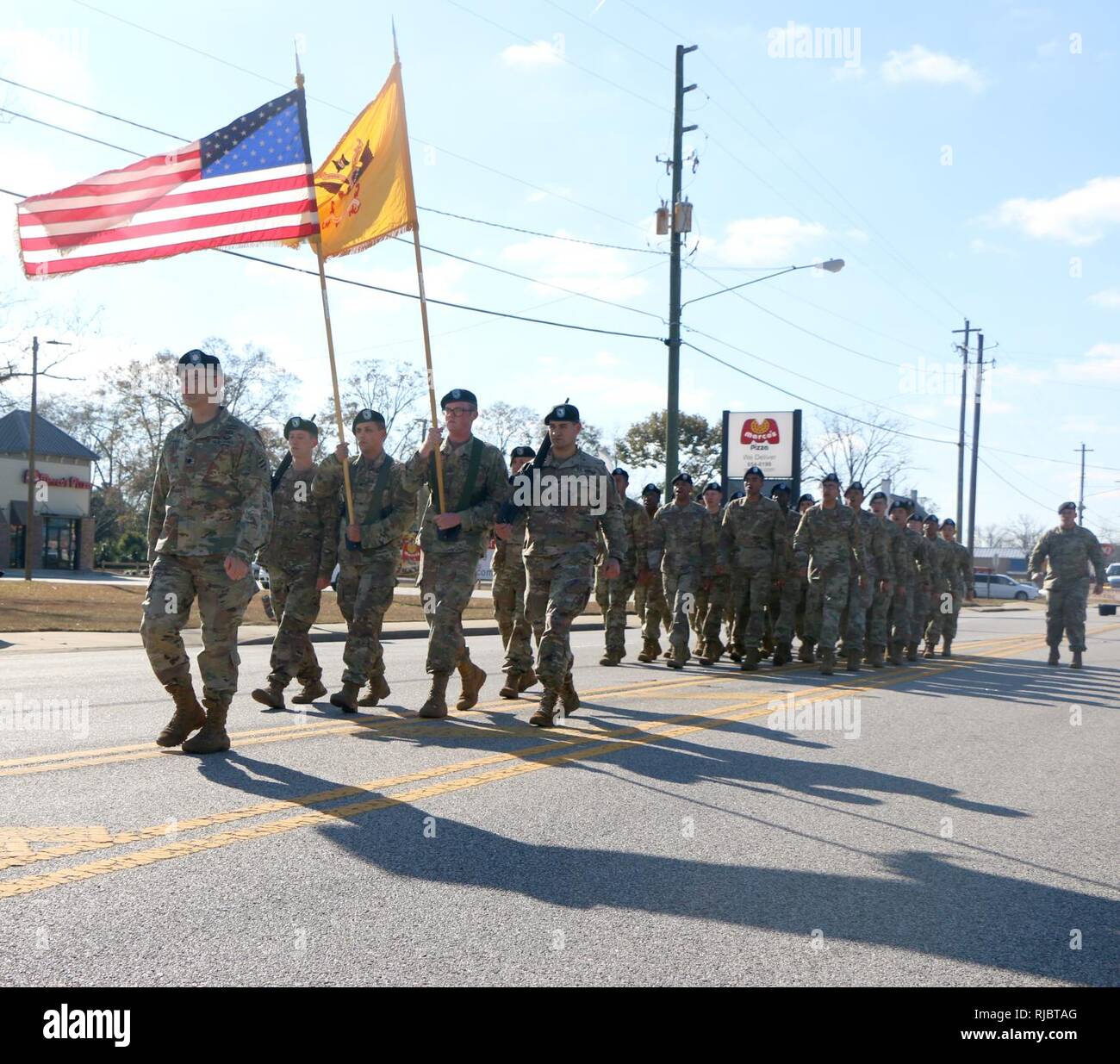 Lt. Col. Theodore Leonard, commander of 2nd Combined Arms Battalion, 69th Armor Regiment, 2nd Armored Brigade Combat Team, 3rd Infantry Division, leads his Soldiers while marching in this year’s Dr. Martin Luther King Jr. Day parade in Glennville, Ga., Jan. 13, 2018. Each year on the third Monday in January,  the United States commemorates the life, legacy, and dream of Dr. King, one of the nation’s most respected leaders. Stock Photo