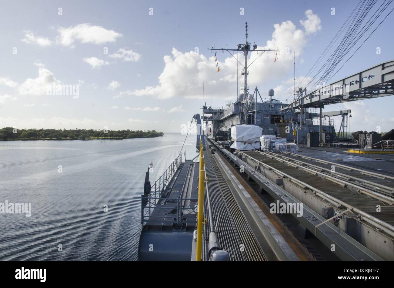 PEARL HARBOR (Jan. 11, 2018) The submarine tender USS Frank Cable (AS 40) departs Joint Base Pearl Harbor-Hickam.  Frank Cable, forward-deployed to Guam, repairs, rearms and reprovisions deployed U.S. Naval Forces in the Indo-Asia-Pacific region. Stock Photo