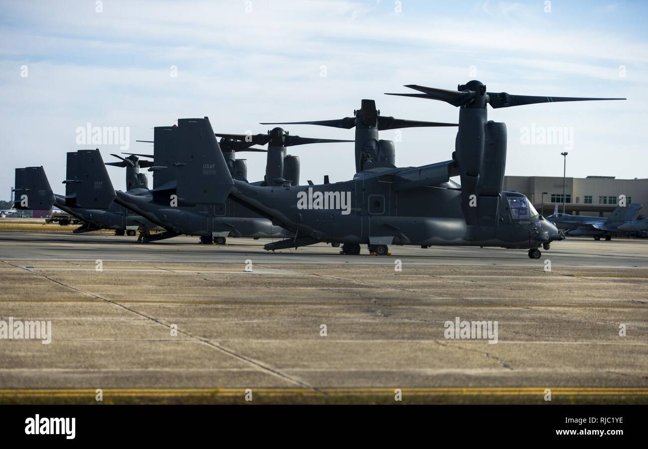 U.S. Air Force CV-22 Ospreys with the 8th Special Operations Squadron sit on the flight line at the Gulfport Combat Readiness Training Center, Miss., during Southern Strike 17, Nov. 2, 2016. Southern Strike 17 is a total force, multi-service training exercise hosted by the Mississippi Air National Guard’s Combat Readiness Training Center in Gulfport, Miss., from Oct. 24 through Nov. 4, 2016. The exercise emphasizes air-to-air, air-to-ground and special operations forces training opportunities. These events are integrated into demanding hostile and asymmetric scenarios with actions from special Stock Photo
