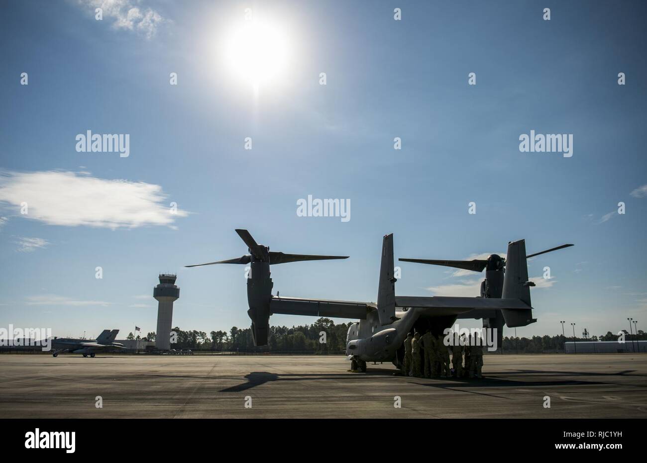 A U.S. Air Force CV-22 Osprey aircrew with the 8th Special Operations Squadron receive a pre-mission brief at the Gulfport Combat Readiness Training Center, Miss., during Southern Strike 17, Nov. 2, 2016. Southern Strike 17 is a total force, multi-service training exercise hosted by the Mississippi Air National Guard’s Combat Readiness Training Center in Gulfport, Miss., from Oct. 24 through Nov. 4, 2016. The exercise emphasizes air-to-air, air-to-ground and special operations forces training opportunities. These events are integrated into demanding hostile and asymmetric scenarios with action Stock Photo