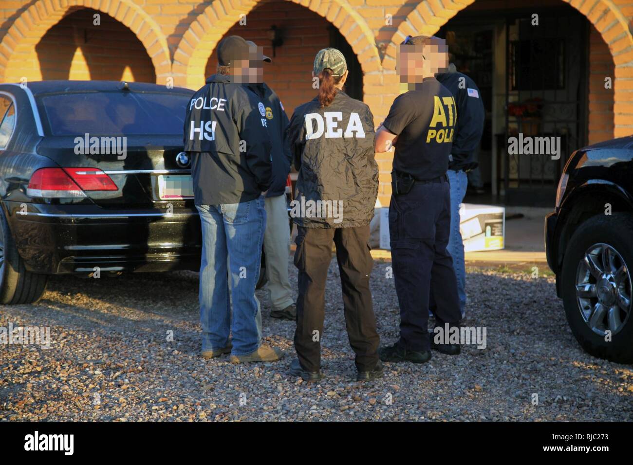 Investigators from multiple federal and local law enforcement agencies, including U.S. Immigration and Customs Enforcement’s (ICE) Homeland Security Investigations (HSI), the Drug enforcement Administration, and the Pima County Sheriff’s Department, executed numerous search and arrest warrants in southern Arizona Thursday, dismantling a local drug trafficking organization suspected of distributing and selling heroin, marijuana, and various firearms. Stock Photo