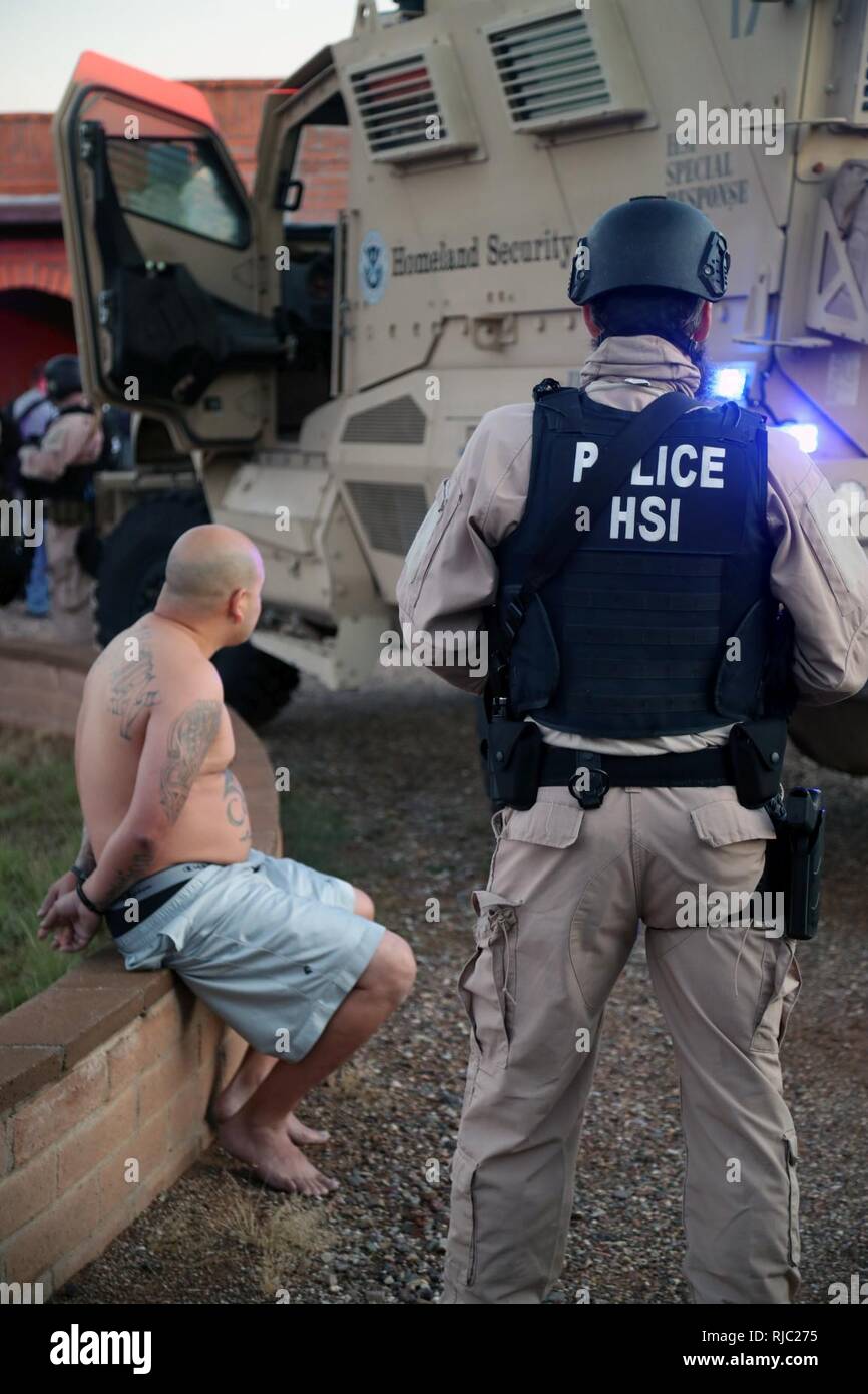 Investigators from multiple federal and local law enforcement agencies, including U.S. Immigration and Customs Enforcement’s (ICE) Homeland Security Investigations (HSI), the Drug enforcement Administration, and the Pima County Sheriff’s Department, executed numerous search and arrest warrants in southern Arizona Thursday, dismantling a local drug trafficking organization suspected of distributing and selling heroin, marijuana, and various firearms. Stock Photo