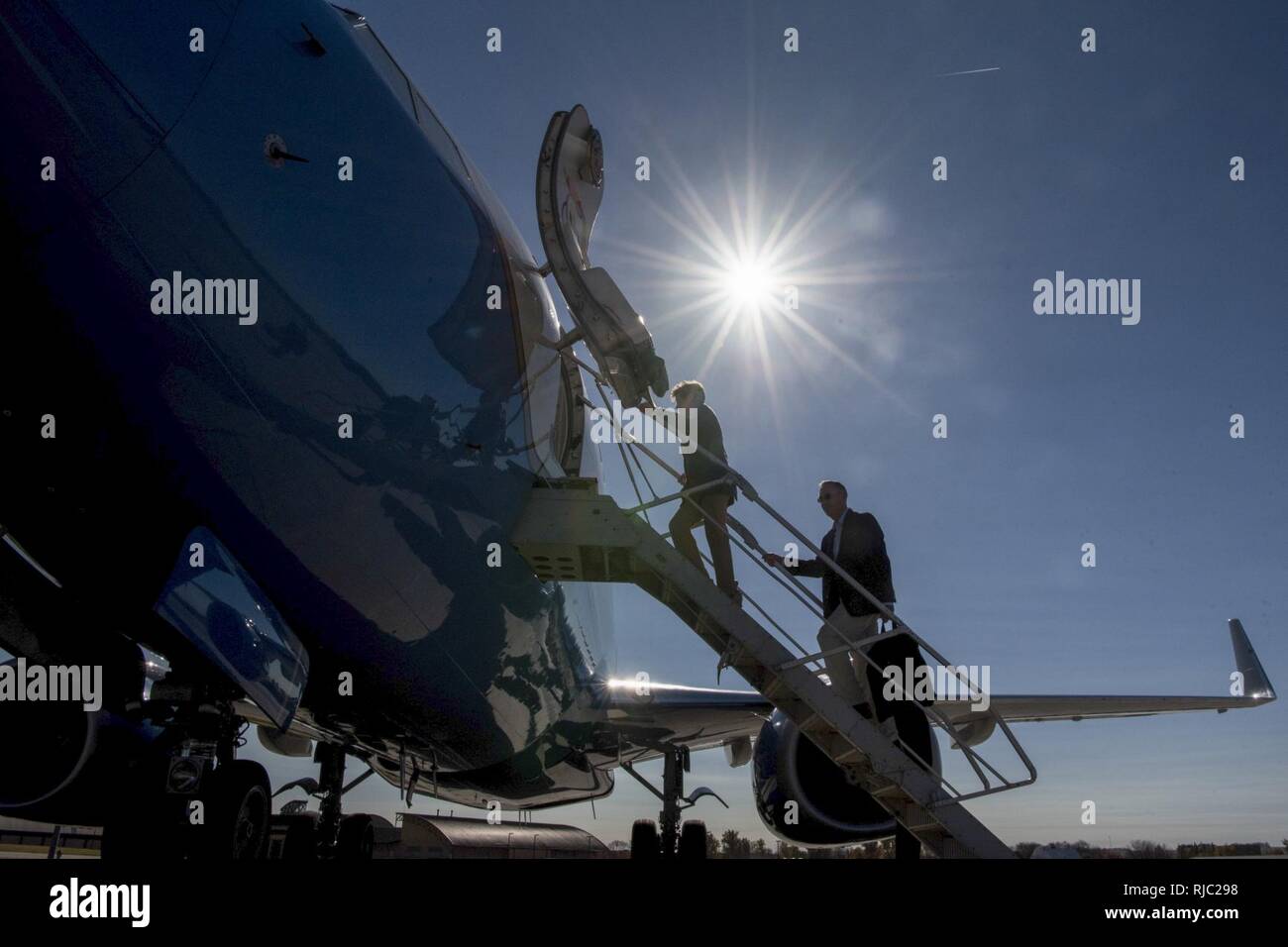 Ellyn Dunford, wife of Marine Gen. Joseph F. Dunford Jr., chairman of the Joint Chiefs of Staff, board a C-40 aircraft  following the Strategic Command change of command ceremony at Offutt Air Force Base, Omaha, Nebraska Nov. 3, 2016.  Air Force Gen. John E. Hyten assumes command from Navy Adm. Cecil D. Haney. Stock Photo