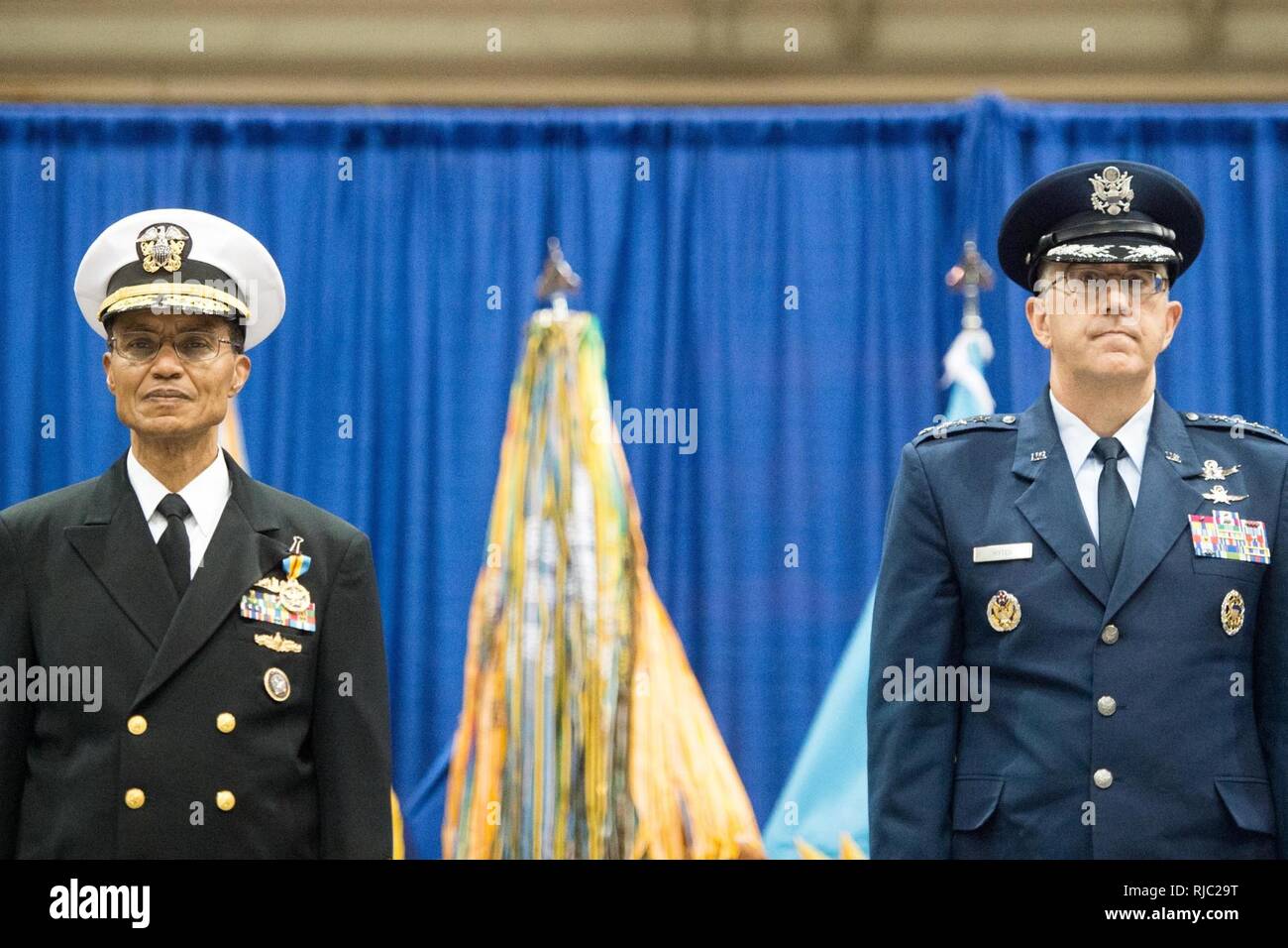 Defense Secretary Ash Carte and Marine Gen. Joseph F. Dunford Jr., chairman of the Joint Chiefs of Staff, participate in the Strategic Command change of command ceremony at Offutt Air Force Base, Omaha, Nebraska Nov. 3, 2016.  Air Force Gen. John E. Hyten assumes command from Navy Adm. Cecil D. Haney. Stock Photo