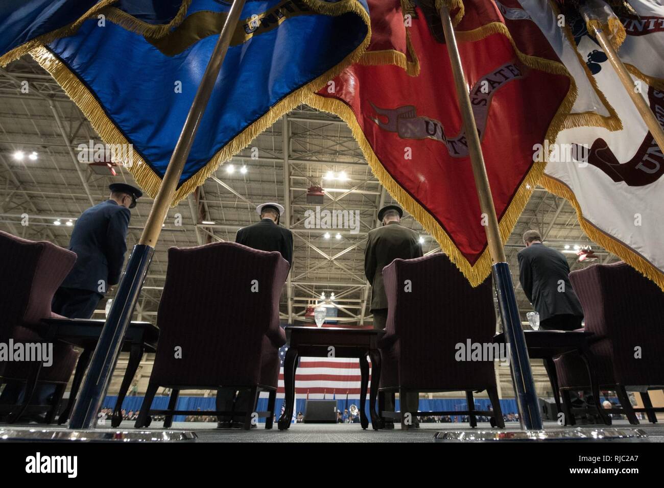 Defense Secretary Ash Carter, Marine Gen. Joseph F. Dunford Jr., chairman of the Joint Chiefs of Staff, Air Force Gen. John E. Hyten, and Navy Adm. Cecil D. Haney participate in the Strategic Command change of command ceremony at Offutt Air Force Base, Omaha, Nebraska Nov. 3, 2016.  Air Force Gen. John E. Hyten assumes command from Navy Adm. Cecil D. Haney. Stock Photo