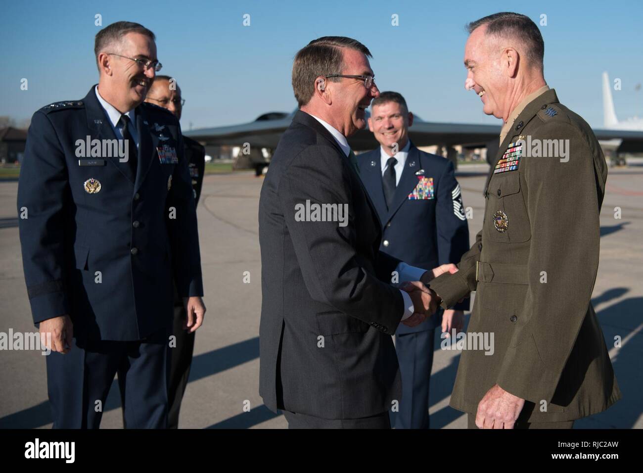 Marine Gen. Joseph F. Dunford Jr., chairman of the Joint Chiefs of Staff, and Defense Secretary Ash Carter participate in the Strategic Command change of command ceremony at Offutt Air Force Base, Omaha, Nebraska Nov. 3, 2016.  Air Force Gen. John E. Hyten assumes command from Navy Adm. Cecil D. Haney. Stock Photo