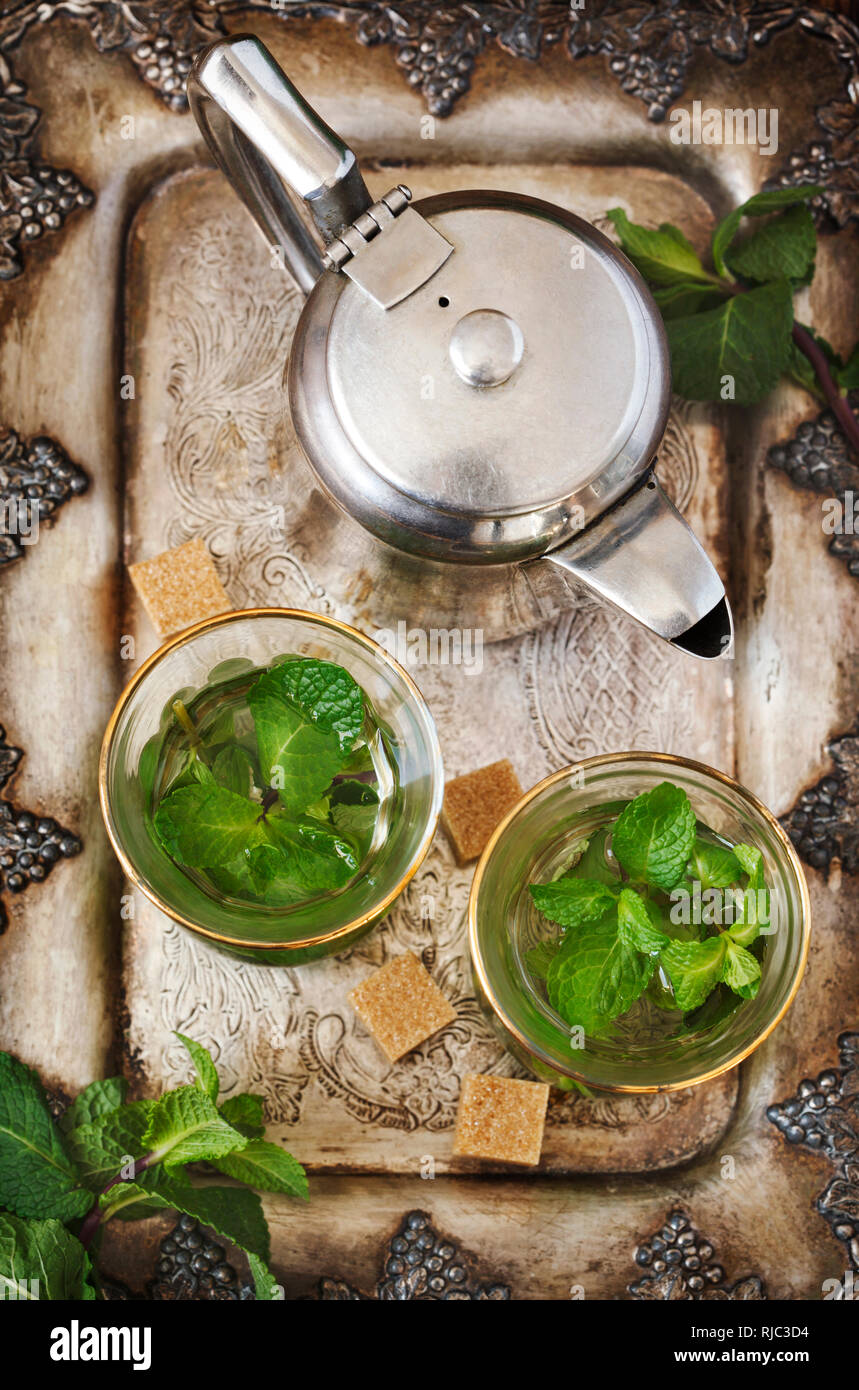 Mint tea with sugar cubes Stock Photo