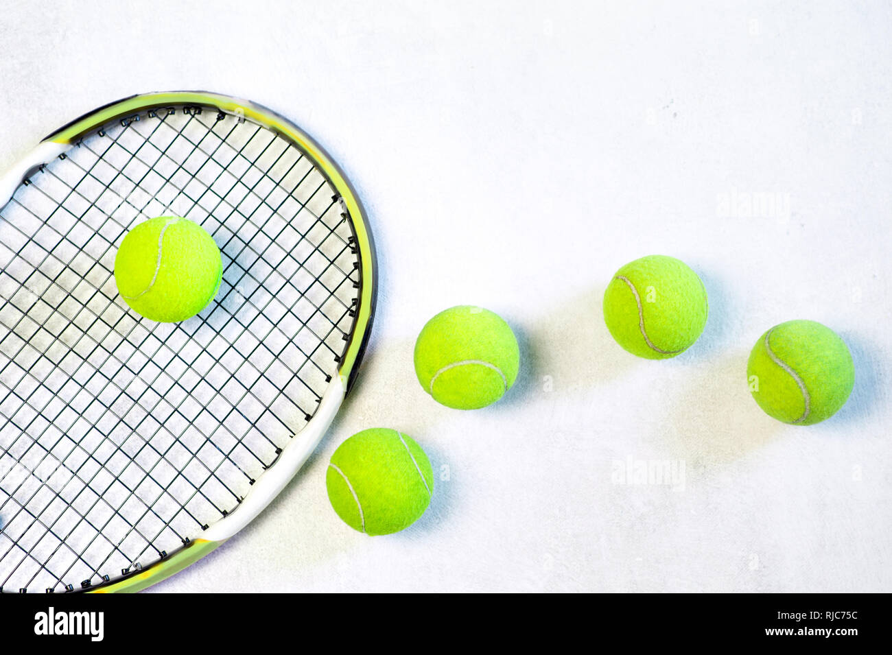 tennis balls and a racket on white background, with copy space Stock ...