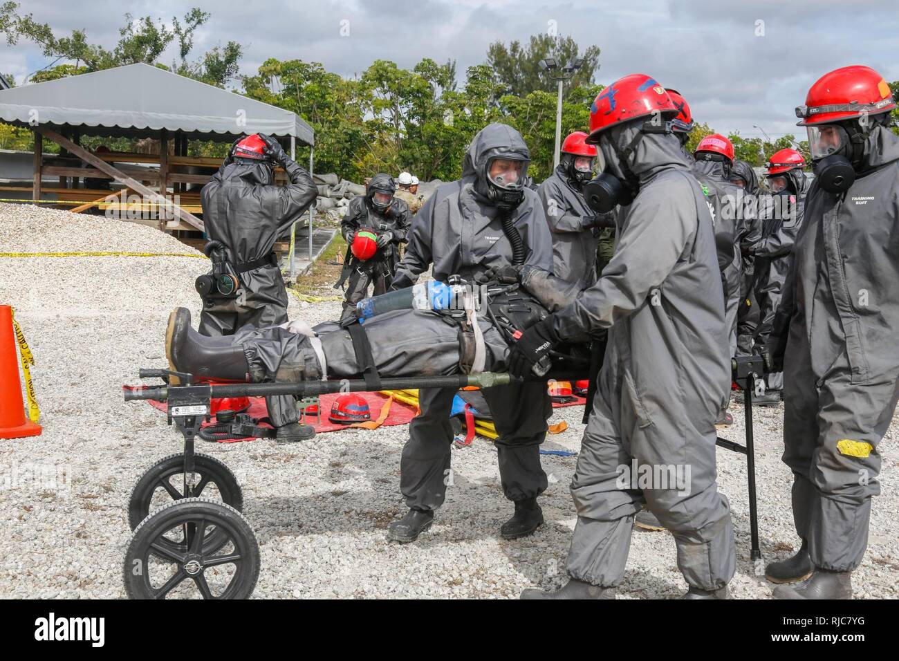 U. S. Army Reserve Soldiers assigned to 468th engineer detachment transports casualties in a Joint Training Exercise on Miami- Dade Fire Rescue Urban Search and Rescue Training Site in Miami, Fla. Jan. 09, 2018. This JTE focused on building response capabilities and seamless transition between the local first responders and the follow-on support provided by the National Guard and Active duty soldiers. (U. S. Army Stock Photo
