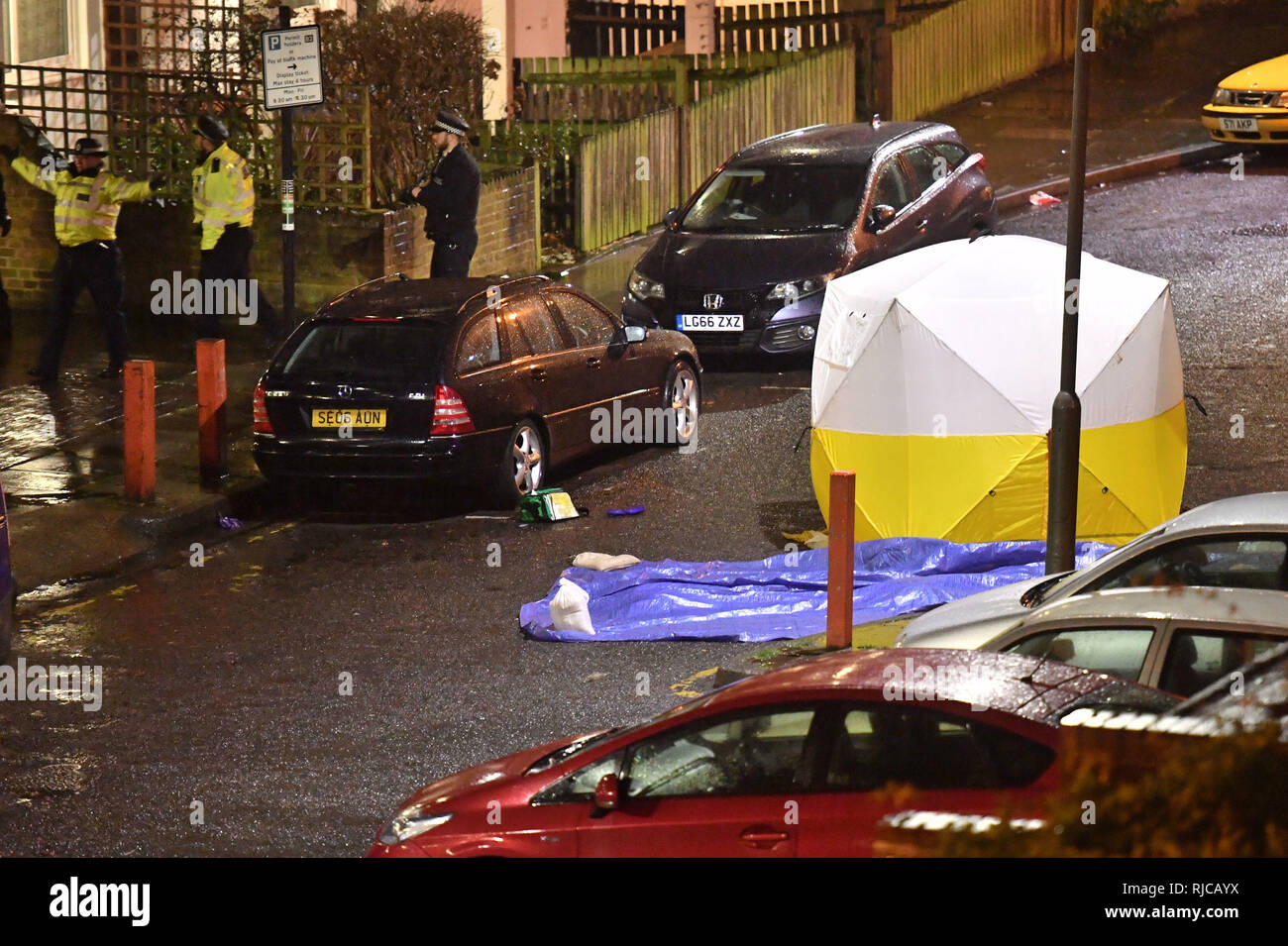A police forensic tent at the scene of a fatal stabbing in Wolsey Court