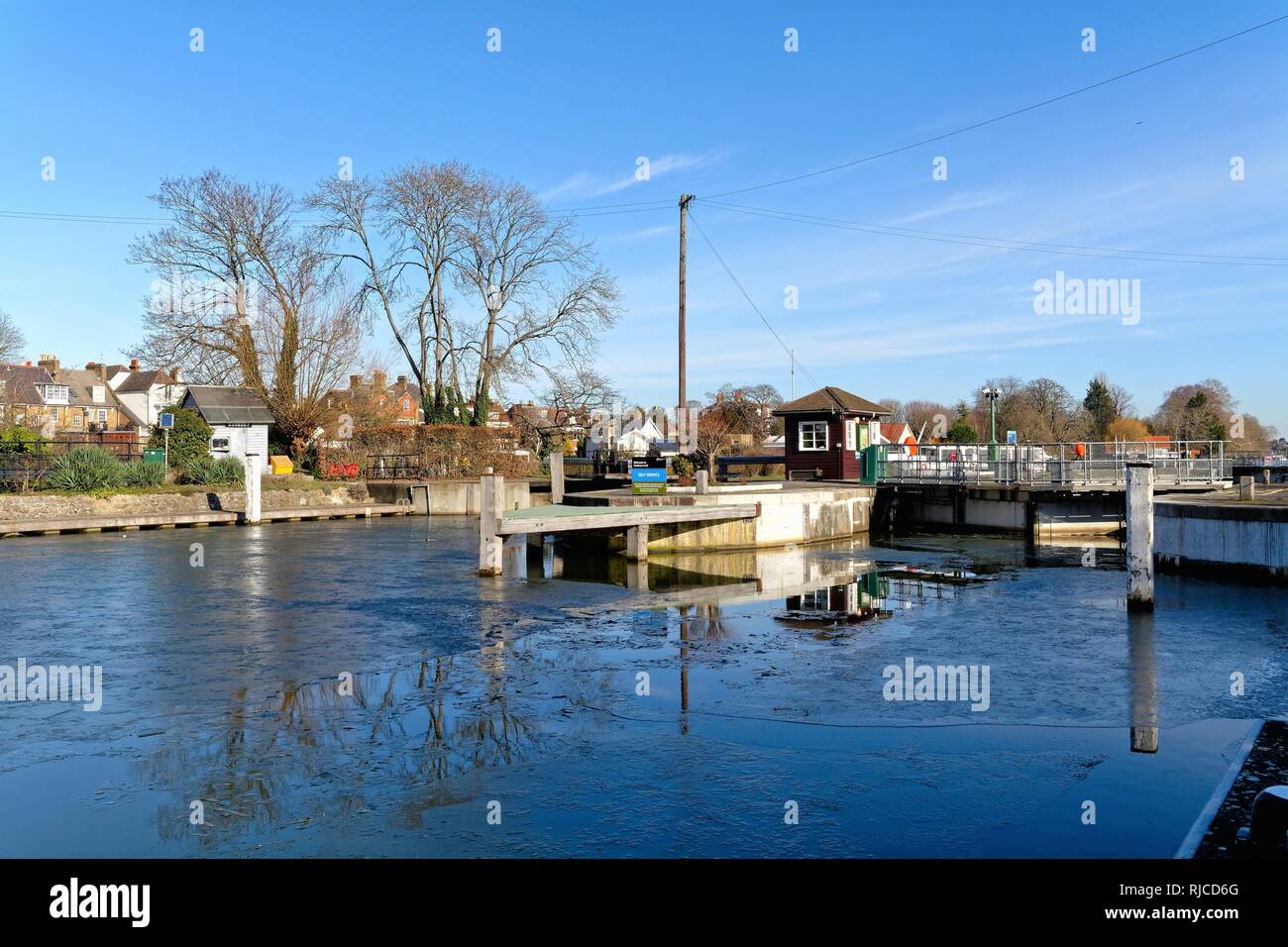 The River Thames at Sunbury Lock Surrey on a sunny winters day England UK Stock Photo