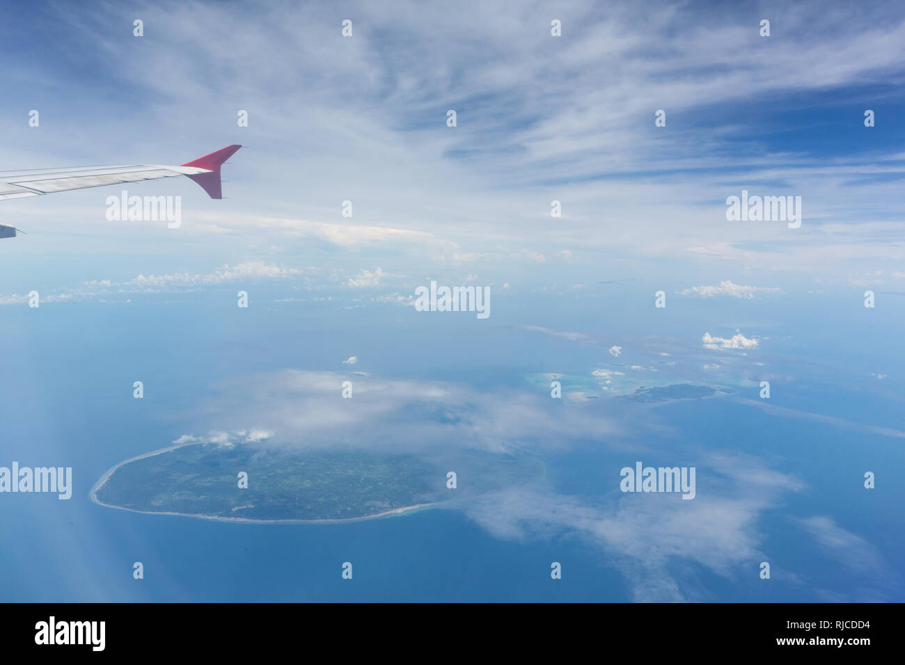 Air plane wing over the land. Can use for airline transportation background. Stock Photo