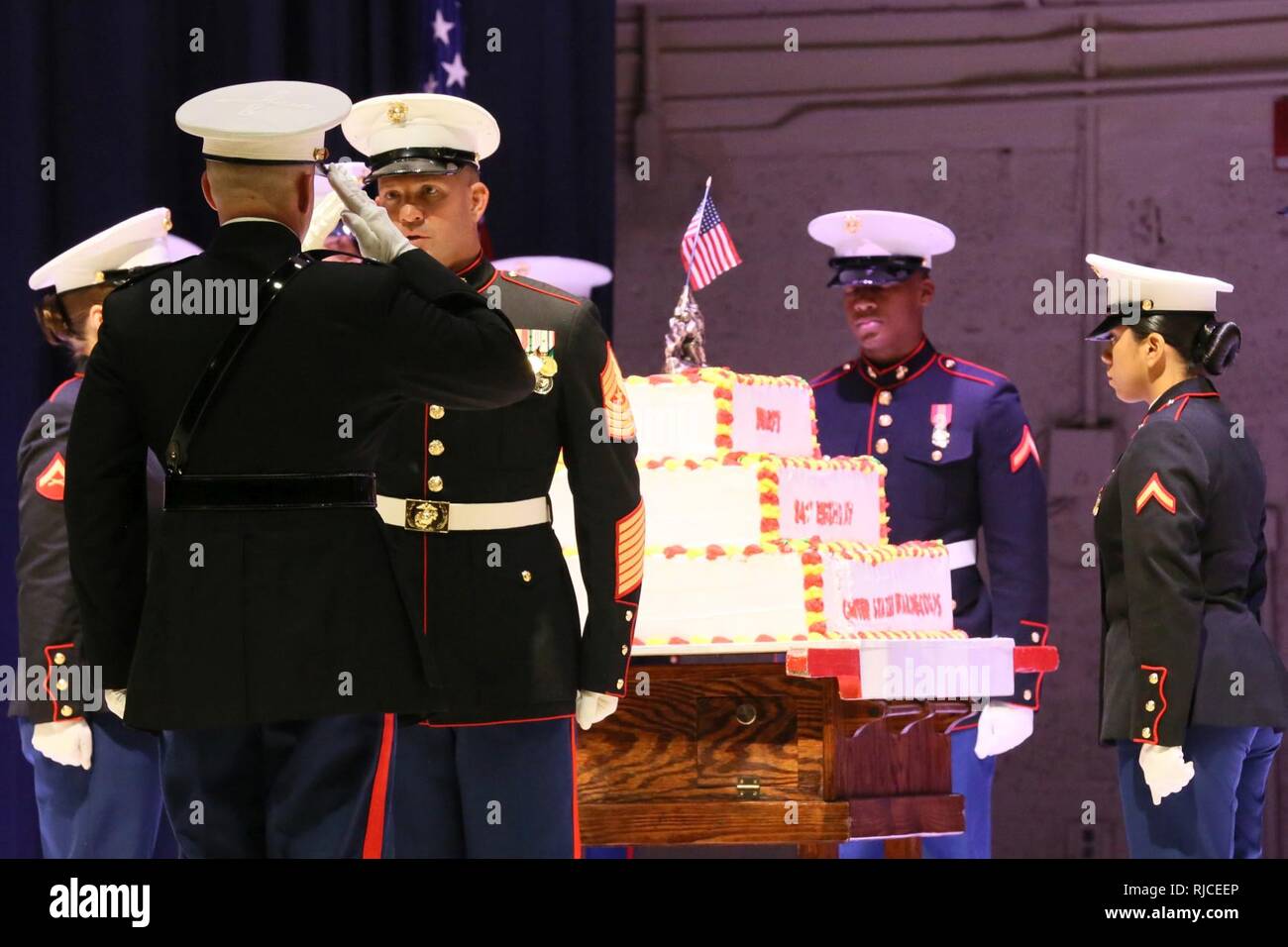Col. Todd Ferry salutes Sgt. Maj. Benjamin Pangborn during the annual
