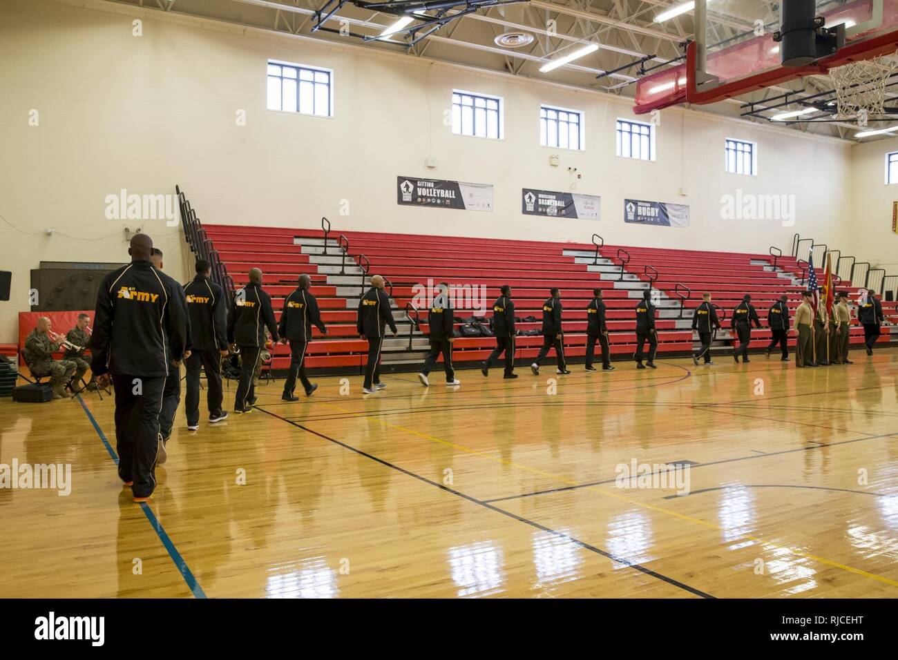 U.S. military members of the All Army basketball team arrive for the