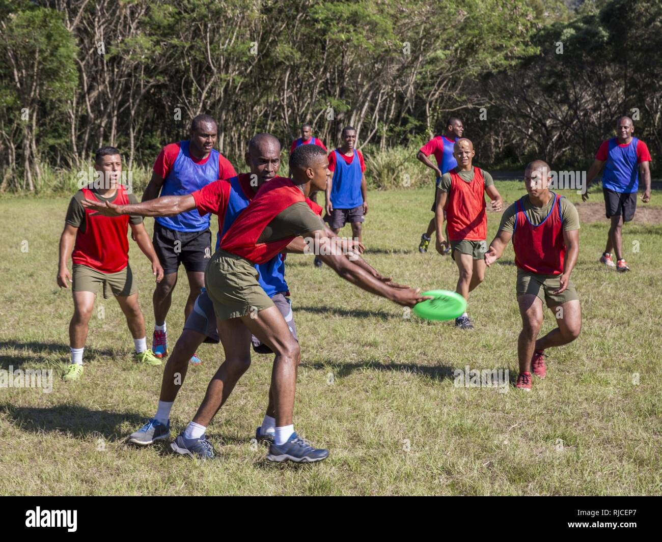 U.S. Marines with Combat Engineer Platoon, Task Force Koa Moana 16-4, play ultimate Frisbee with the Republic of Fiji Military Forces during Croix Du Sud in Plum, New Caledonia, Nov. 6, 2016. Croix Du Sud is a multi-national, humanitarian assistance disaster relief and non-combatant evacuation operation exercise conducted every two years to prepare nations in the event of a cyclone in the South Pacific. The Koa Moana exercise seeks to enhance senior military leader engagements between allied and partner nations in the Pacific with a collective interest in military-to-military relations. Stock Photo