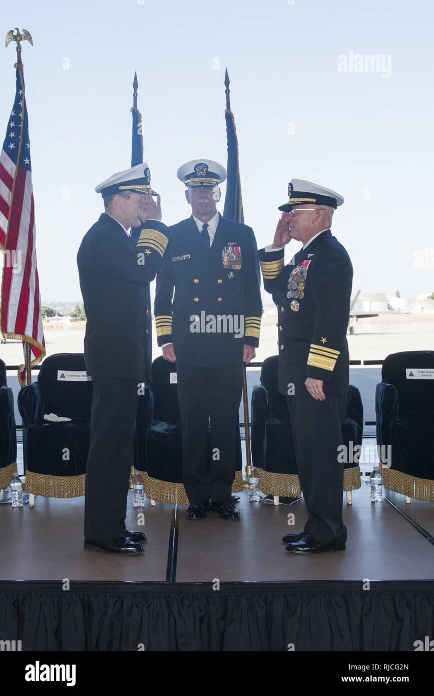 SAN DIEGO (January 11, 2018) Vice Adm. Mike Shoemaker, left, and Vice Adm. DeWolfe Miller III, right, render a hand salute during a Commander, Naval Air Forces change of command ceremony at Naval Air Station North Island. Miller relieved Shoemaker as commander of Naval Air Forces. Stock Photo