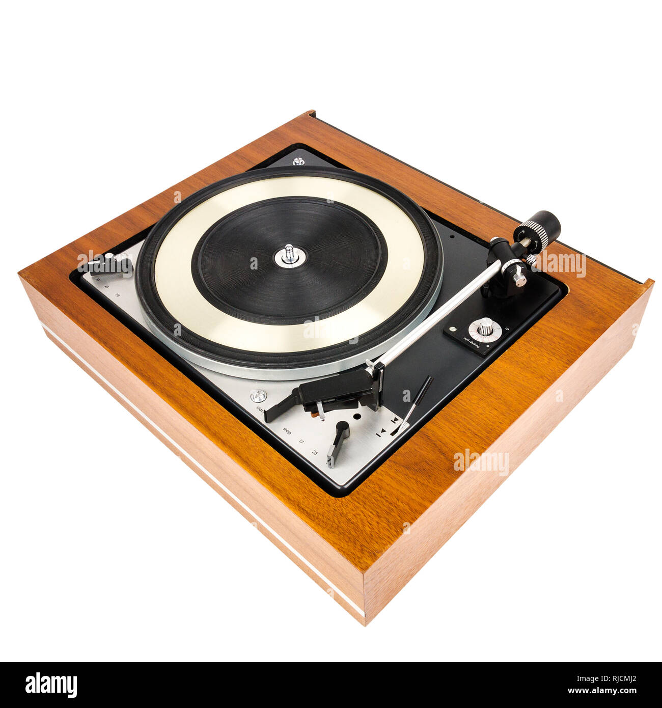 Vintage turntable vinyl record player isolated on white. Wooden plinth ...