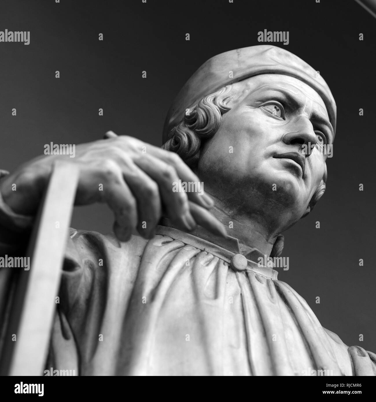 Statue of Arnolfo di Cambio Looking up at the Duomo Florence Cathedral Stock Photo