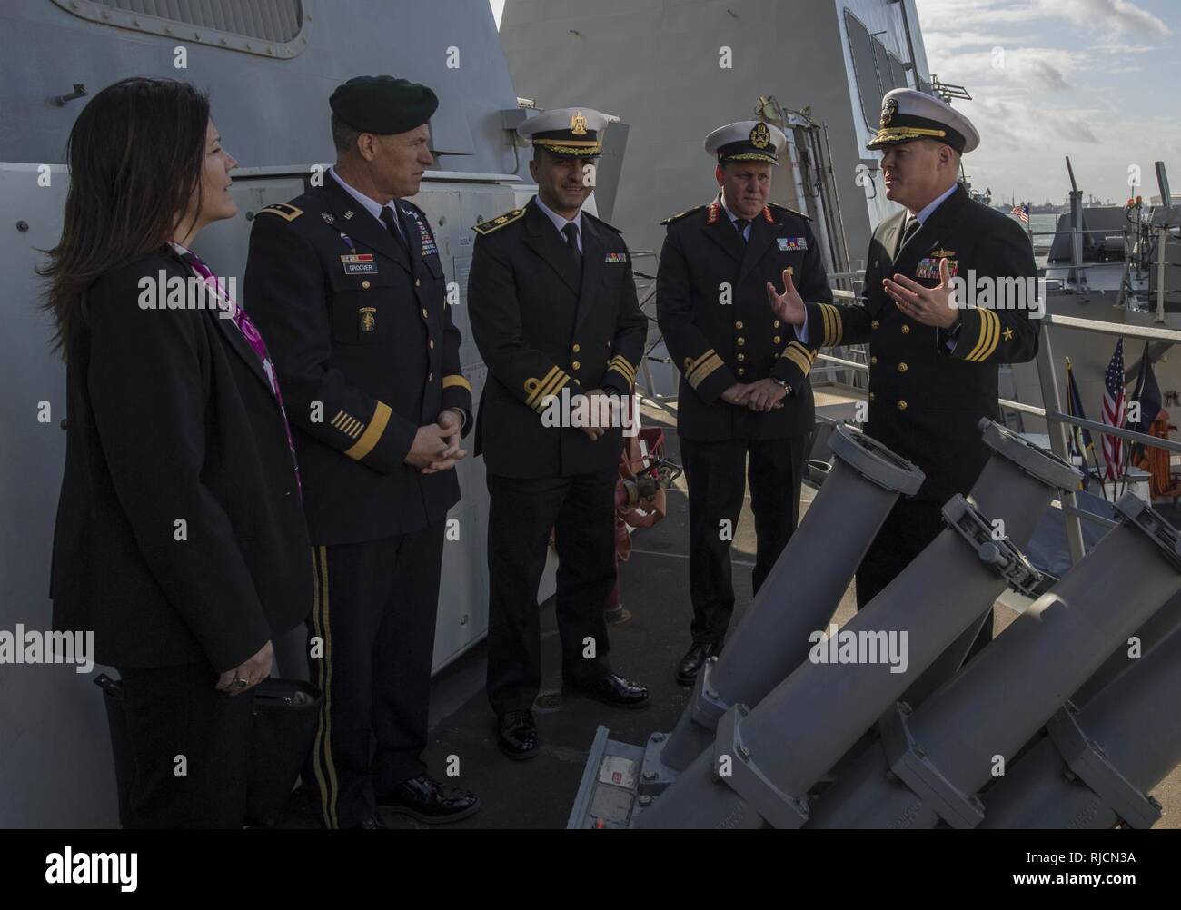 ALEXANDRIA, Egypt (Jan. 17, 2017) Cmdr. Peter Halvorsen, right, commanding officer of the Arleigh Burke-class guided-missile destroyer USS Carney (DDG 64) gives a ship's tour to U.S. Embassy Cairo Deputy Chief of Mission Dorothy Shea , U.S. Army Major General Ralph Groover, second from left, defense attaché and Egyptian Navy Rear Adm. Ehab Mohamed Sobhy, second from right, commander of Alexandria Naval Base, during a scheduled port visit in Alexandria, Egypt. Carney, forward-deployed to Rota, is on its fourth patrol in the U.S. 5th Fleet area of operations in support of maritime security opera Stock Photo