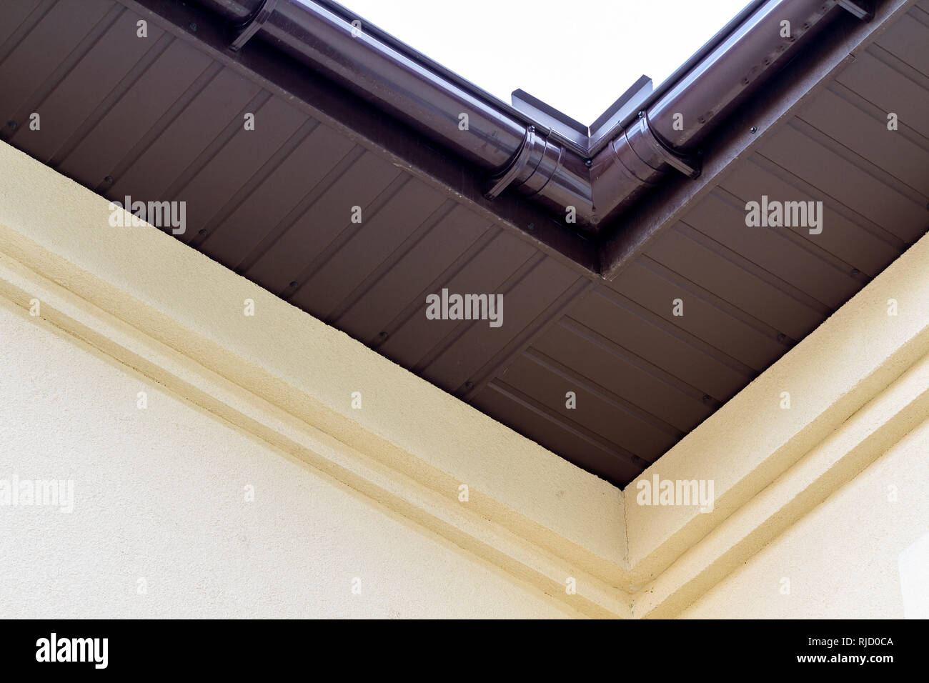 Close Up Detail Of Cottage House Corner With Brown Metal Planks