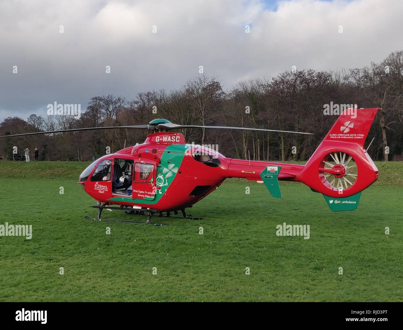 Newport Wales - January 22, 2019, An Airbus EC145 helicopter of the Wales Air Ambulance service after landing in Tredegar park on an emergency call. Stock Photo