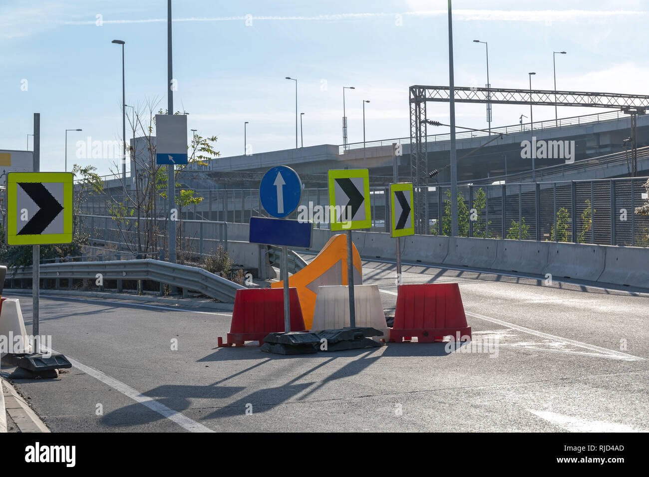 Road Works Diversion Direection Arrows and Barrier Stock Photo