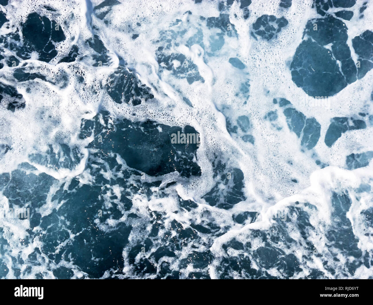Close-up photo of seawater photographed from above a cruise ship in the Philippines Stock Photo