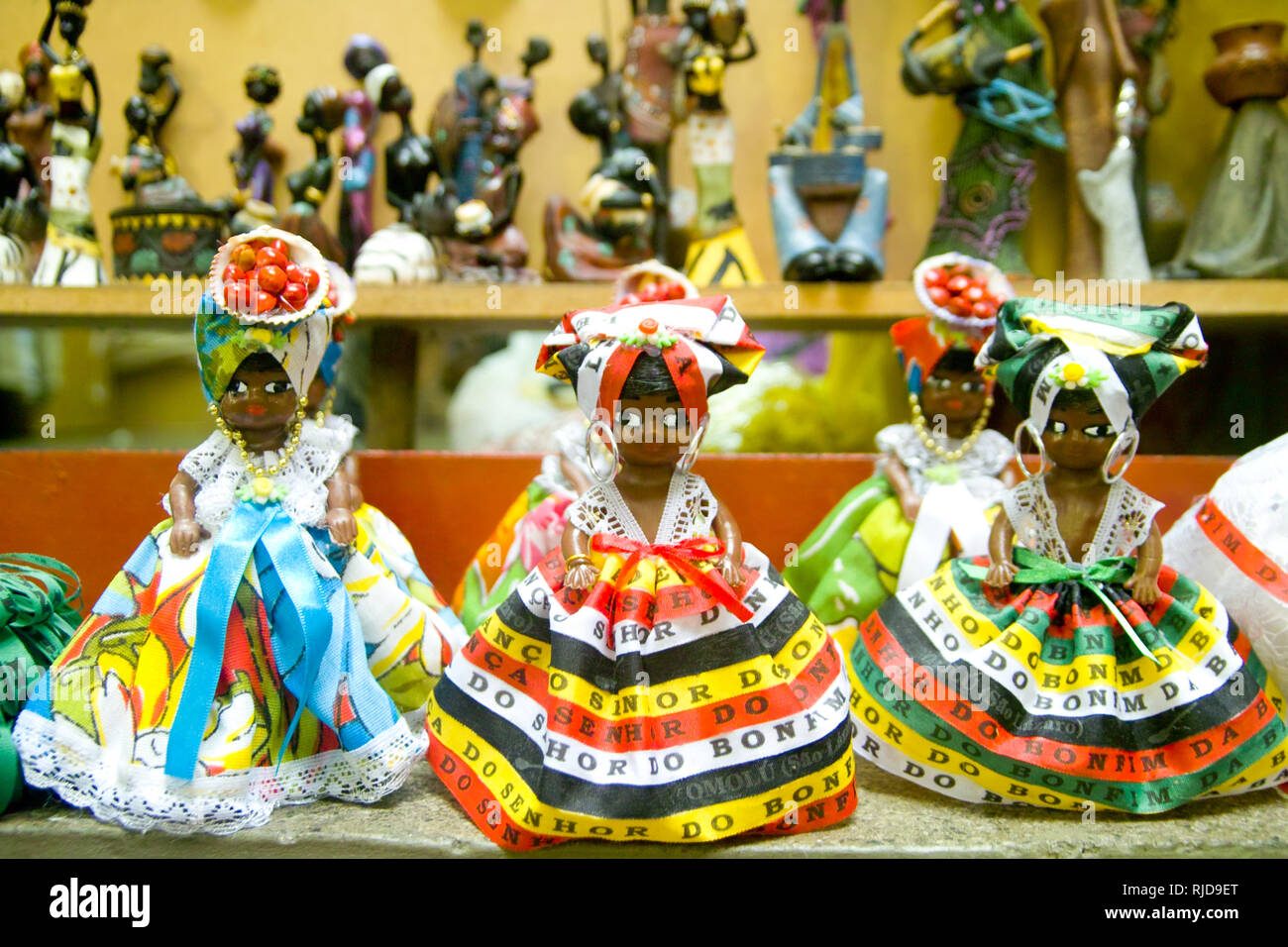 Colorful, souvenir, fridge magnet figurines of women from bahia in  traditional dress on display Salvador, Bahia, Brazil Stock Photo - Alamy