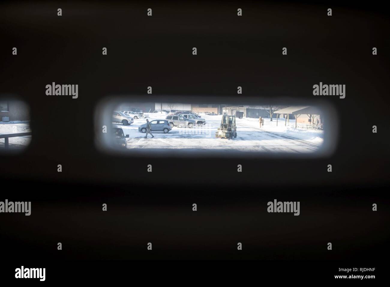 Airmen from the 179th Airlift Wing safely transfer munitions from the ...