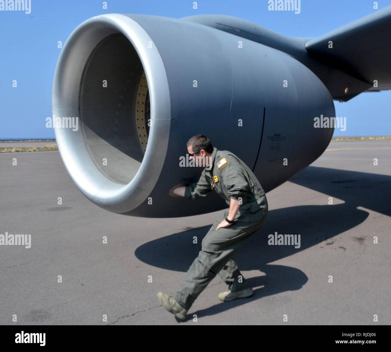 Lt. Col. Stuart Letcher, 465th Refueling Squadron KC-135 Stratotanker pilot from Tinker Air Force Base, Okla., inspects the aircraft during flight preparations Jan. 22, 2018, at Kona International Airport, Hawaii, in support of Exercise Sentry Aloha. Stock Photo