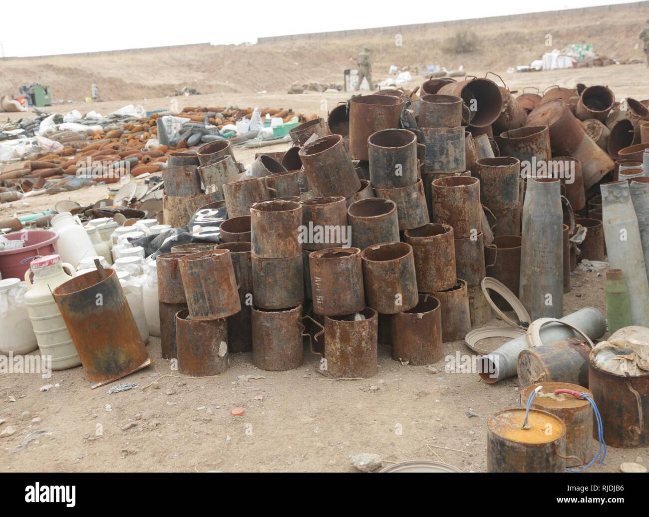 Improvised explosive devices sit at an unexploded ordinance device consolidation site in Tel ‘Afar, Iraq, Jan. 18, 2018. The 15th Iraqi Army Division cleared the IEDs that were left behind by ISIS from the town. Stock Photo