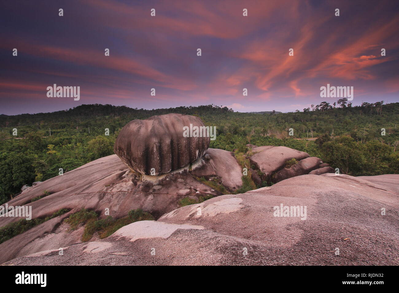 Batu Banitan Hill is a super large granite stone as high as 100 meters  above sea level (MDPL Stock Photo - Alamy