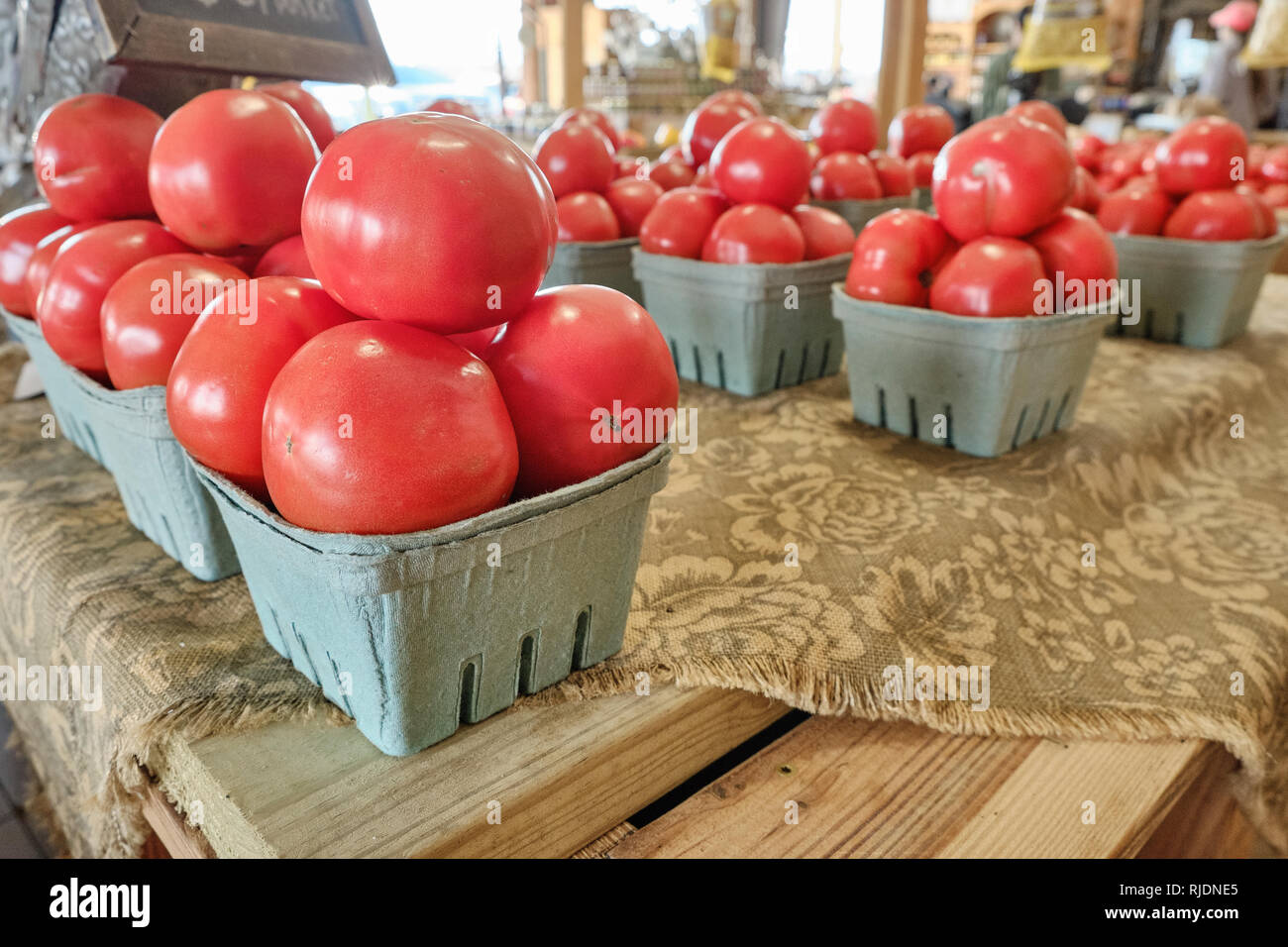 Farm fresh beefsteak tomatoes on display for sale in a rural Alabama farmer's market or roadside market in Pike Road Alabama, USA. Stock Photo