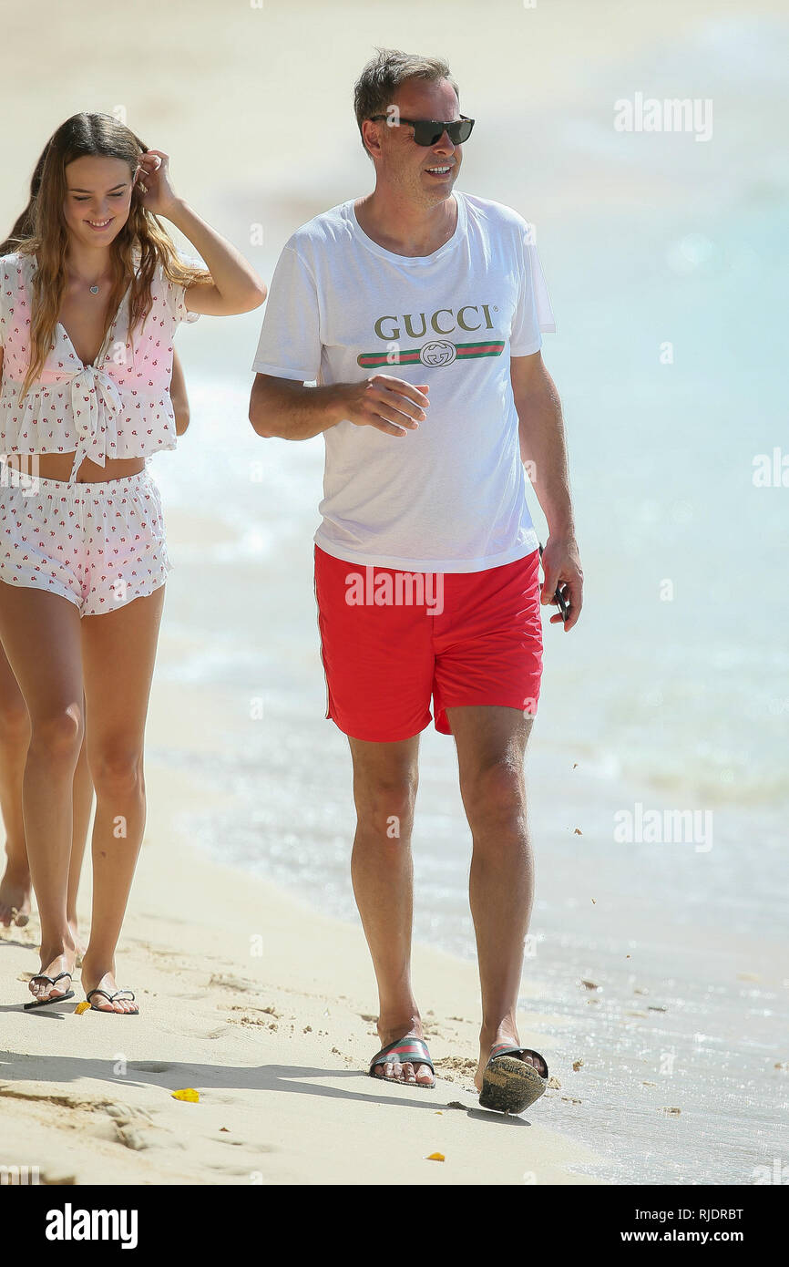 Dragon's Den star Peter Jones seen getting onto a boat with his wife Tara Capp and friends.  Featuring: Peter Jones Where: Barbados, Barbados When: 05 Jan 2019 Credit: WENN.com Stock Photo