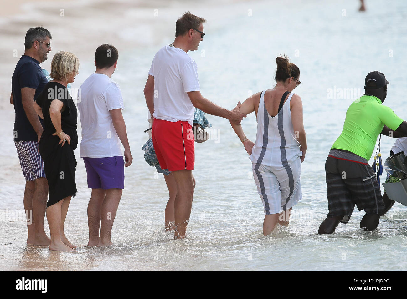 Dragon's Den star Peter Jones seen getting onto a boat with his wife Tara Capp and friends.  Featuring: Peter Jones, Tara Capp Where: Barbados, Barbados When: 05 Jan 2019 Credit: WENN.com Stock Photo