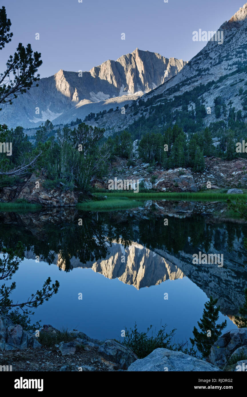 Mount Goode reflected in Long Lake in the Sierra Nevada Mountains of California Stock Photo