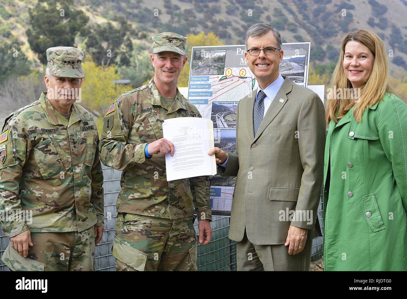 From left to right, Lt. Gen. Todd Semonite, commanding general of U.S. Army Corps of Engineers; Col. Kirk Gibbs, commander of the U.S. Army Corps of Engineers Los Angeles District; Gary Lee Moore, Los Angeles city engineer; and Carol Armstrong, executive officer to the Los Angeles Deputy Mayor of City Services, pose for a picture Jan. 19 after Corps of Engineers leaders presented a signed design agreement with the city to move forward with the Los Angeles River Ecosystem Restoration project. The design agreement allows the Corps’ Los Angeles District to begin the preconstruction, engineering a Stock Photo