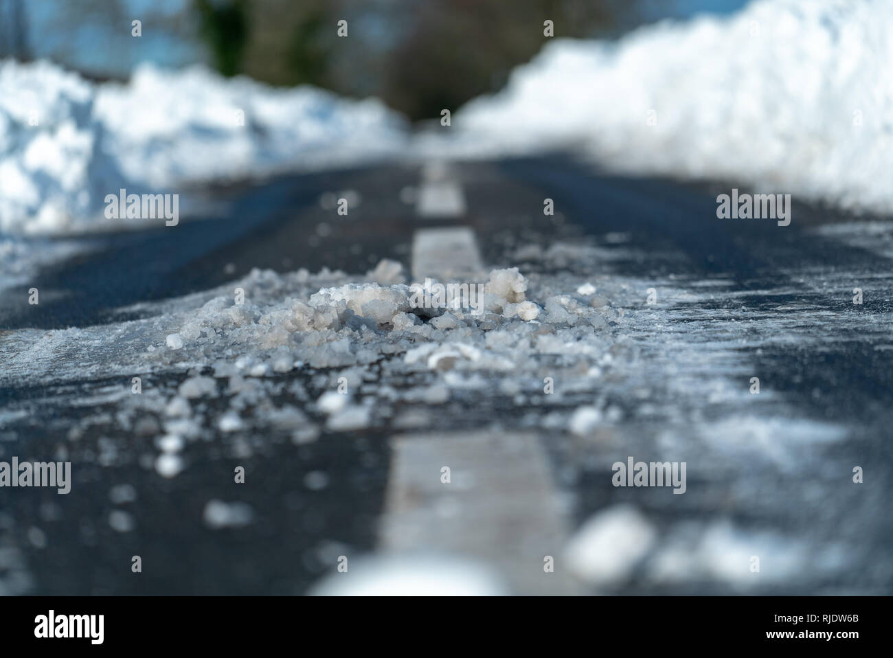 Melting Snow on the Road in Somerset Stock Photo