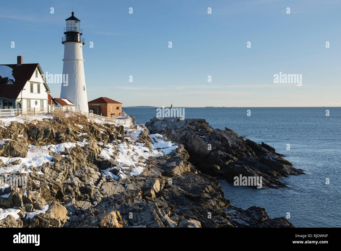 Portland Head Light at Fort Williams Park during the winter months. Located in Cape Elizabeth, Maine, Portland Head Light is Maine's oldest lighthouse Stock Photo