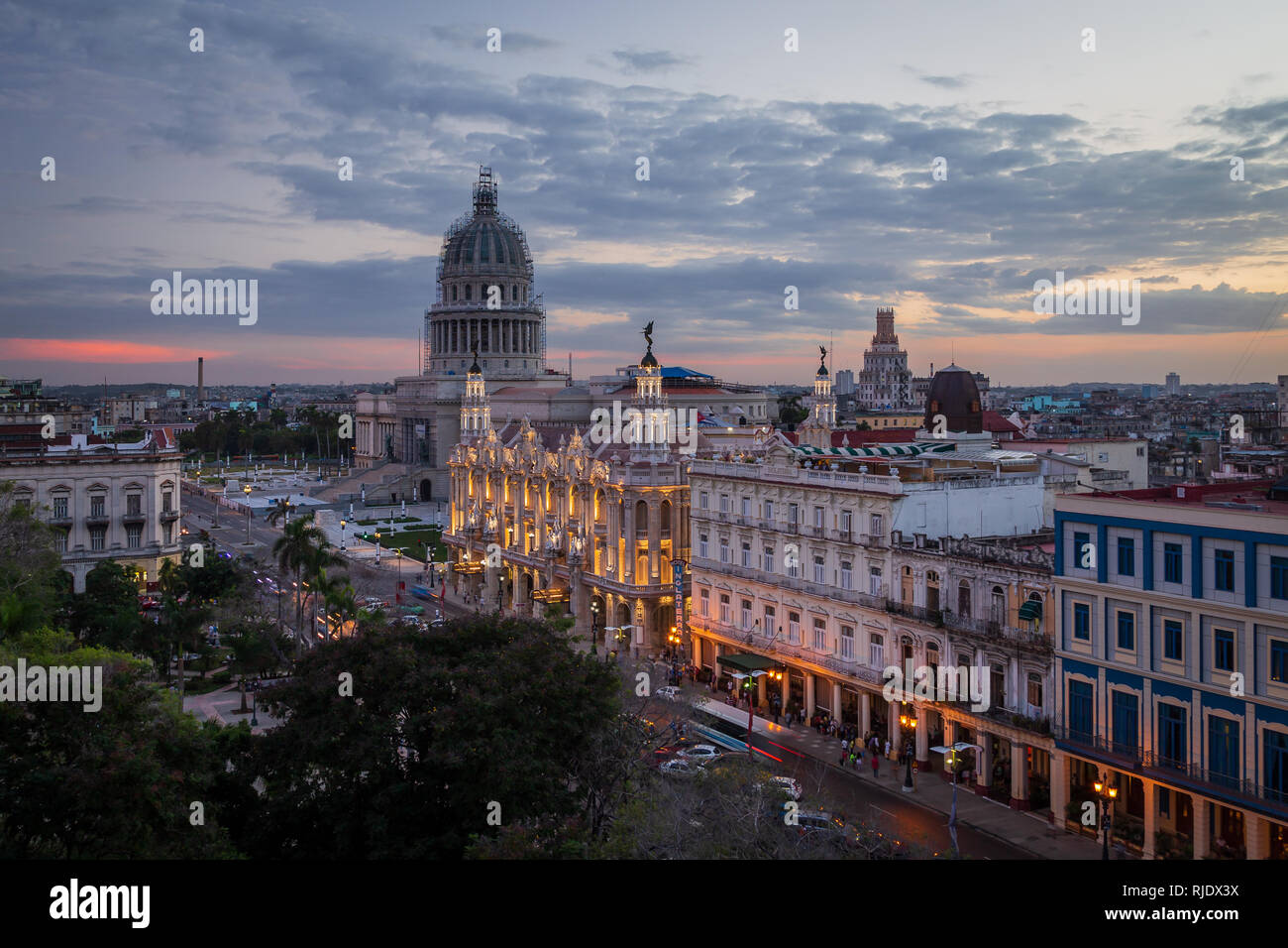 View from the roof of Hotel Parque Central at the Paseo de Marti street and at the El Capitolio, National Capitol Building in Havana, Cuba at sunset Stock Photo