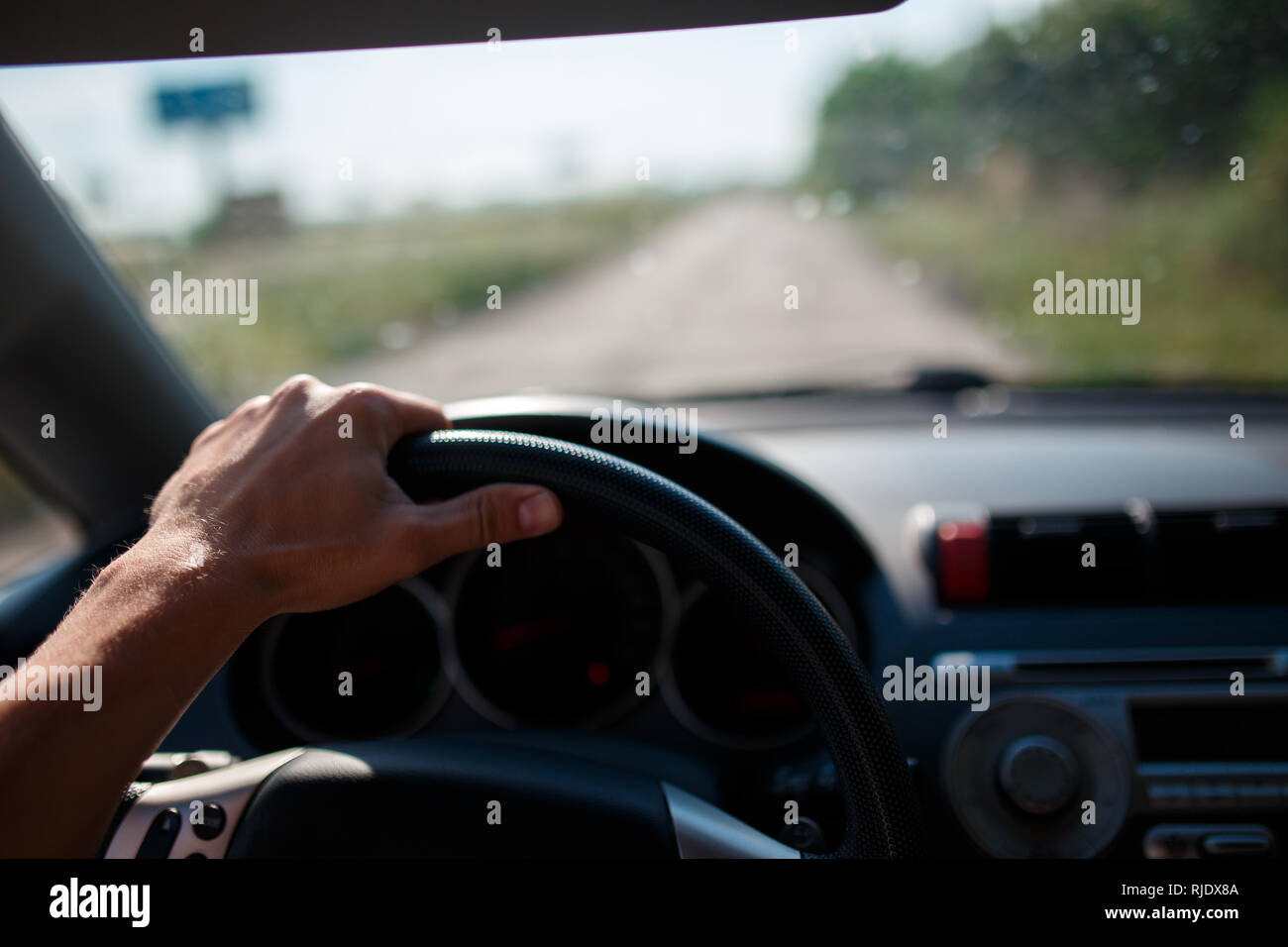 Drivers hand holding steering wheel hi-res stock photography and images ...